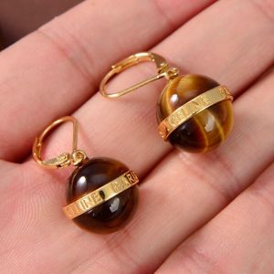 Celine Tiger Eye Quartz Earrings in Brass with Celine Paris Signature Gold/Brown