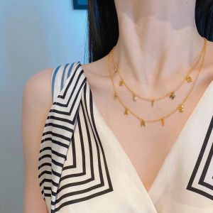 Celine Paris Double Necklace in Brass Gold