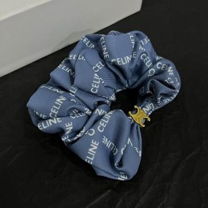 Celine Triomphe Rayure Scrunchy in Silk and Brass with Allover Celine Print Navy Blue